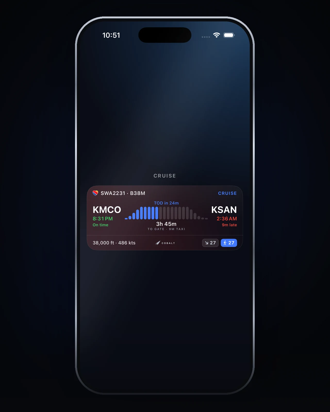 iPhone Lock Screen with the Cobalt Live Activity: KMCO to KSAN at cruise, 3h 45m to gate, top of descent in 24 minutes